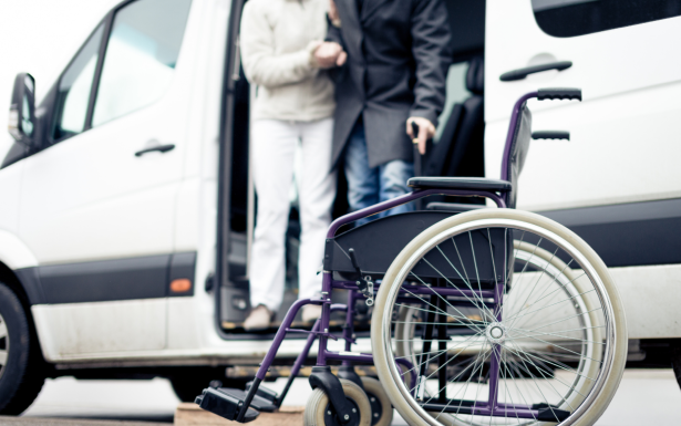 Picture of a wheelchair in front of the Adairs wheelchair accessible van